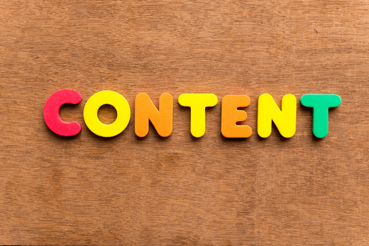 "CONTENT" spelled out in colorful letter magnets